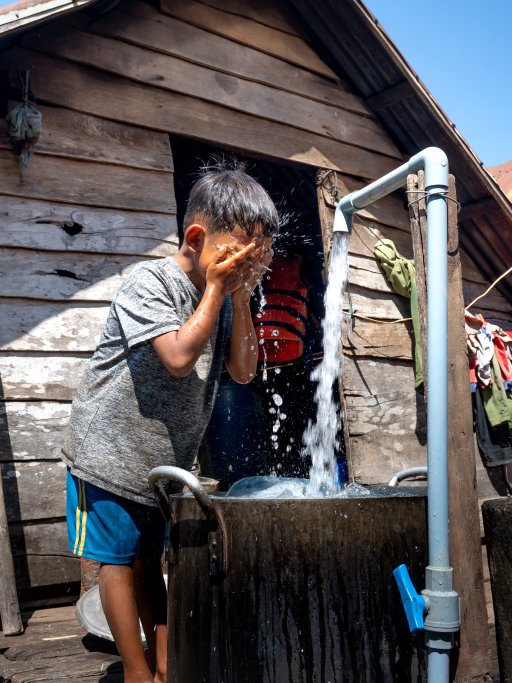 a boy with water