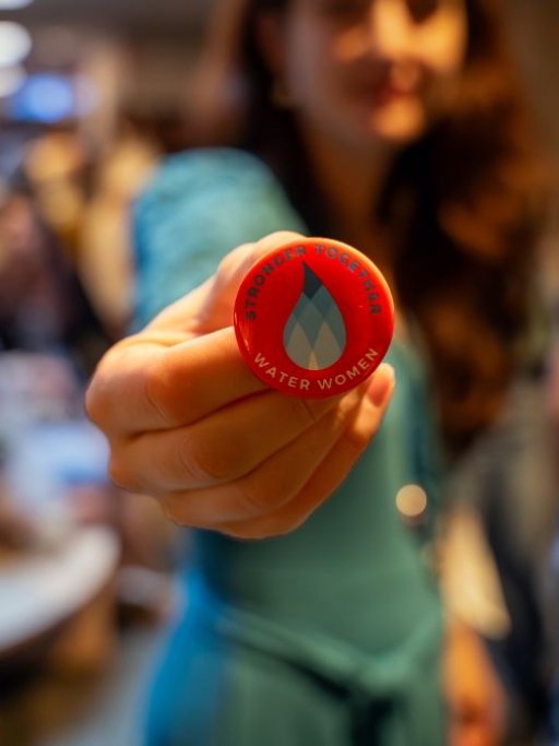 A women showing a button